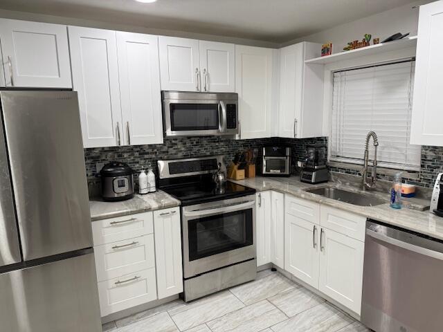 1961 Woolbright Rd in Boynton Beach, FL - Building Photo - Building Photo