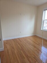 49 Woodcliff St, Unit 3 in Boston, MA - Foto de edificio - Building Photo