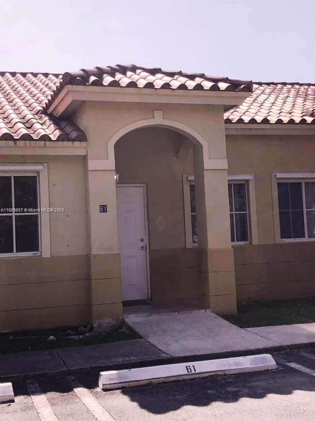 property at 61 NE 13th Ave