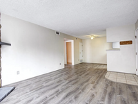 8555 Fairmount Dr, Unit C105 in Denver, CO - Building Photo - Building Photo