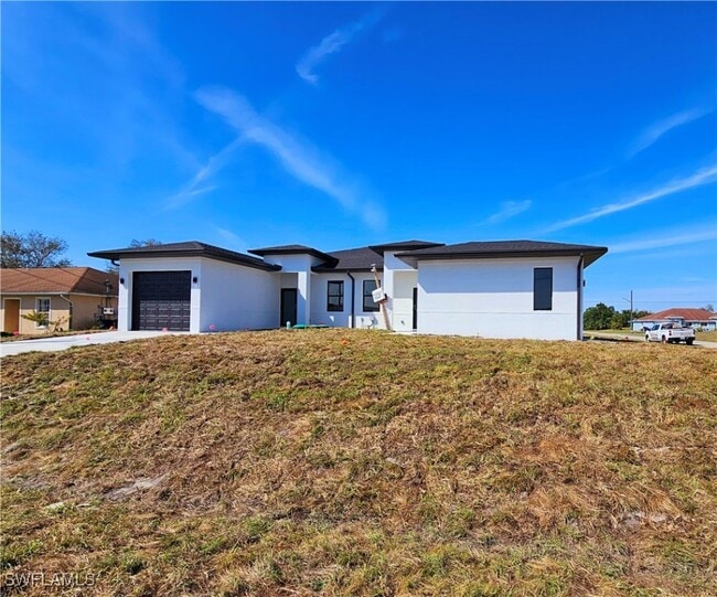 1100 Homer Ave S in Lehigh Acres, FL - Building Photo - Building Photo