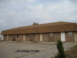 107 S Grant St in Russell, KS - Building Photo