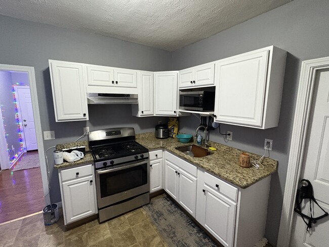 89 3rd St, Unit Apt 1 in Lowell, MA - Foto de edificio - Building Photo