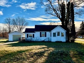 303 Meguzee Point Rd in Elk Rapids, MI - Building Photo