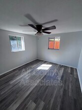 7710 Rohuna Dr in New Port Richey, FL - Building Photo - Building Photo