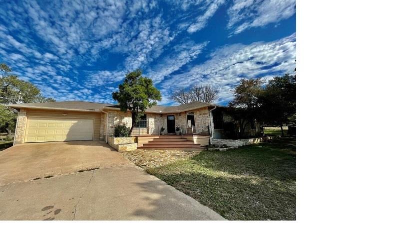 1045 Hidden Hills Dr in Dripping Springs, TX - Building Photo