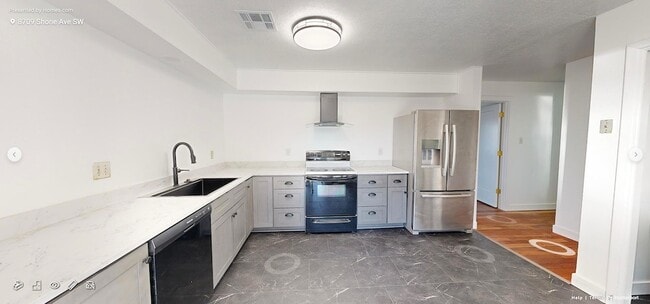 property at 8709 Shone Ave SW