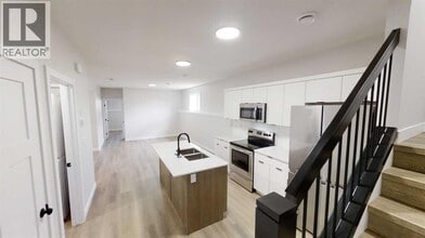 10406-10129 129 Ave in Grande Prairie, AB - Building Photo - Building Photo