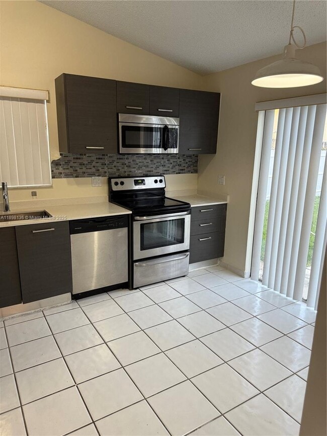 property at 14450 SW 95th Terrace