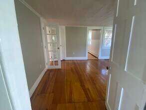 82 Riverside St, Unit 1 in Lowell, MA - Foto de edificio - Building Photo