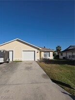 3715 SW Santa Barbara Pl in Cape Coral, FL - Building Photo