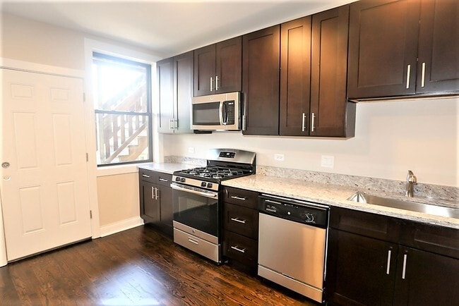 4447 N Rockwell St, Unit 1 in Chicago, IL - Foto de edificio - Building Photo