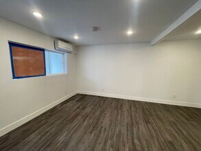210 W 57th St, Unit 3/4 in Los Angeles, CA - Foto de edificio - Building Photo