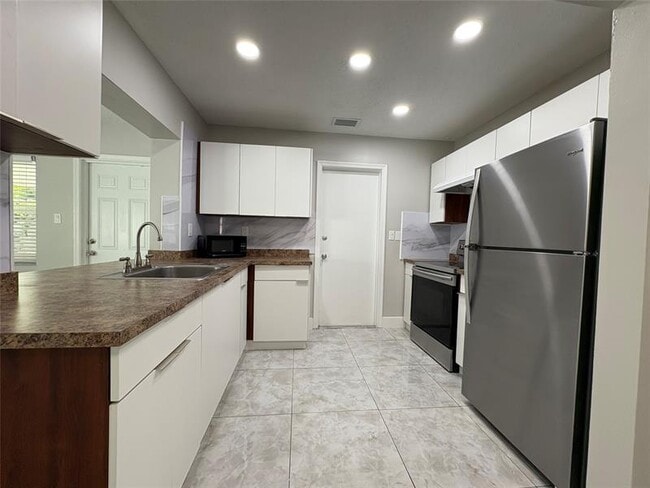 property at 6712 NW 60th St