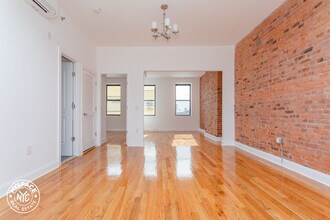 56-48 Myrtle Ave-Unit -1 in Queens, NY - Building Photo - Building Photo