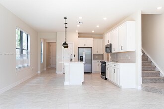 8648 Escue St in Wellington, FL - Foto de edificio - Building Photo