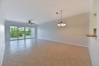 10030 Maddox Ln-Unit -APT 201 in Bonita Springs, FL - Building Photo - Building Photo