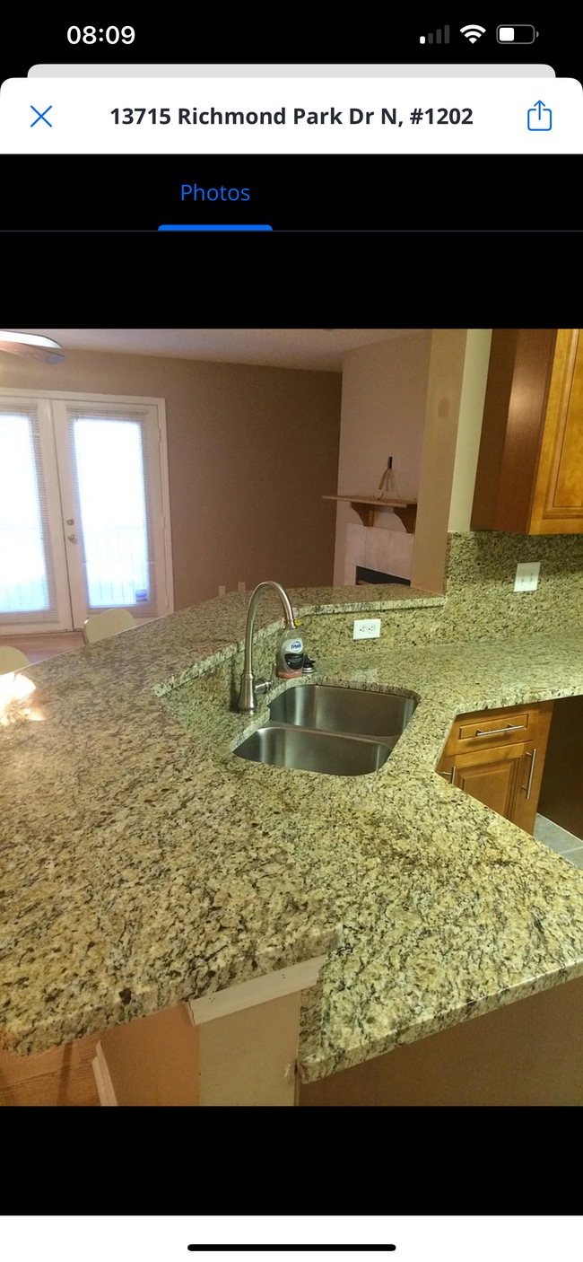 property at 13715 Richmond Park Dr N