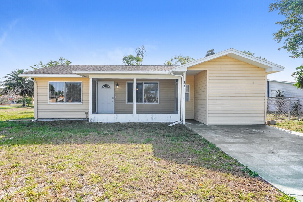 405 Morgan Cir S in Lehigh Acres, FL - Foto de edificio