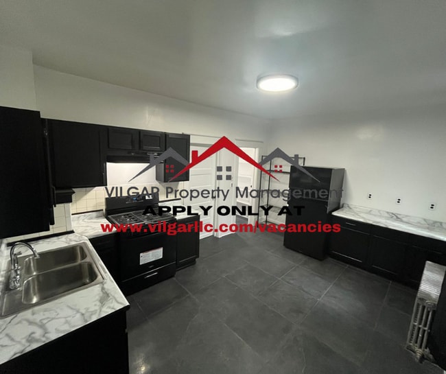 property at 5035 Olcott Ave