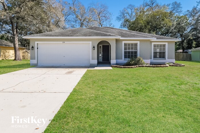 228 Roosevelt Ave in Masaryktown, FL - Building Photo