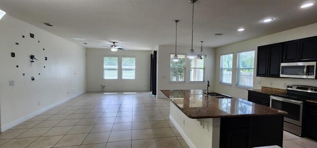 14632 Trapper Rd in Orlando, FL - Building Photo - Building Photo