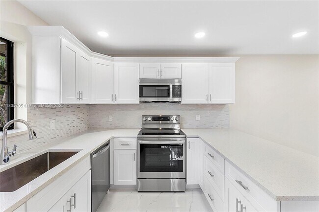 7744 Courtyard Run W in Boca Raton, FL - Building Photo - Building Photo