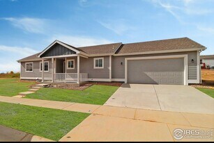 Excellent 3-Bedroom Home in Evans With Great Backyard & Attached Garage! in Evans, CO - Building Photo