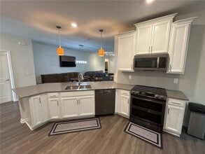 4858 MAGNETITE Loop in Mount Dora, FL - Building Photo - Building Photo