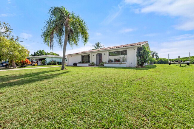 property at 1075 SE Coral Reef St