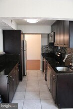 7927 Mandan Rd-Unit -204 in Greenbelt, MD - Building Photo - Building Photo