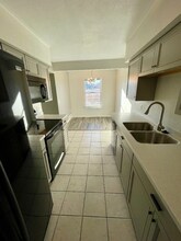 7395 E Eastman Ave, Unit L101 in Denver, CO - Foto de edificio - Building Photo