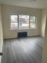10304 97th Ave, Unit 1 in Ozone Park, NY - Building Photo - Building Photo