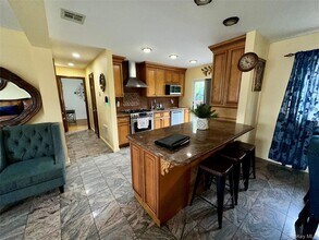 1316 Mcclure Ave in Elmont, NY - Foto de edificio - Building Photo