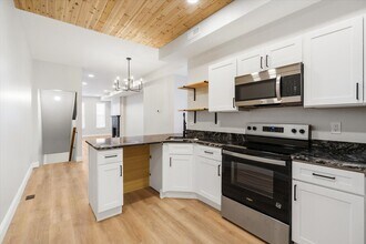 1415 E Lanvale St in Baltimore, MD - Foto de edificio - Building Photo