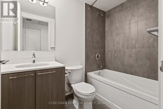 7437 Kingston Rd in Toronto, ON - Building Photo - Building Photo