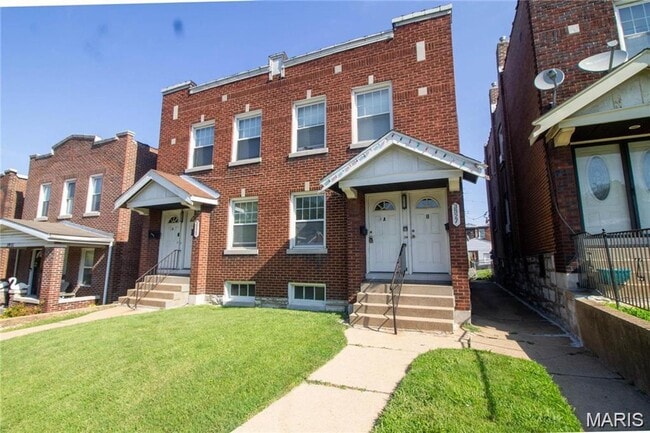 property at 3927 Tholozan Ave