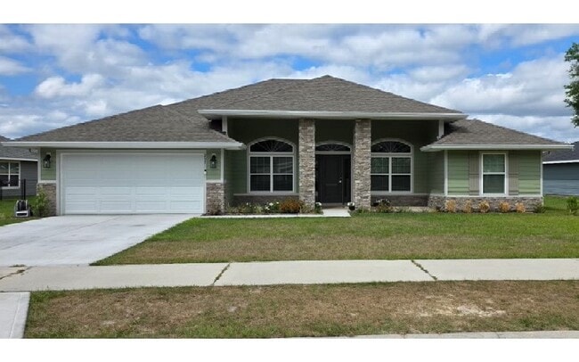 property at 297 SW Silverpalm Dr