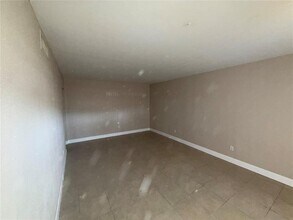 7602 W Powhatan Ave in Town 'n' Country, FL - Building Photo - Building Photo