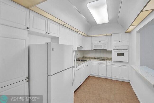 property at 19390 Collins Ave