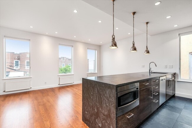 property at 69-54 74th St