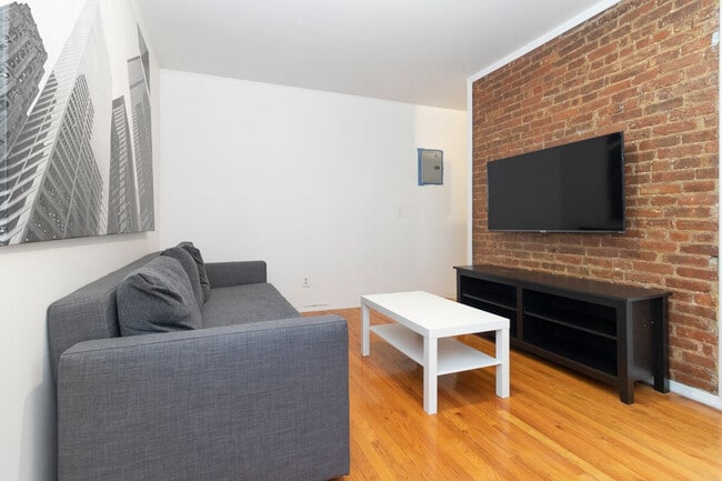309-311-311 E 95th St in New York, NY - Building Photo - Building Photo