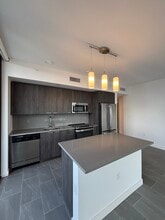 133 NE 24th St, Unit B19 in Miami, FL - Foto de edificio - Building Photo