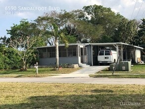 6590 Sandalfoot Blvd in Boca Raton, FL - Building Photo - Building Photo