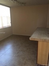 9451 Evergreen Pl-Unit -207 in Davie, FL - Building Photo - Building Photo