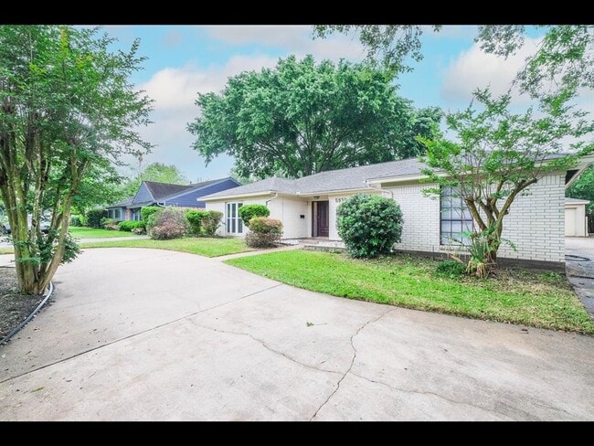 property at 5939 W Bellfort Ave