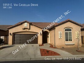 5959 E Via Casella Dr in Fresno, CA - Building Photo