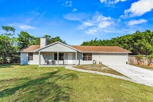 18055 Sycamore Dr W in The Acreage, FL - Building Photo