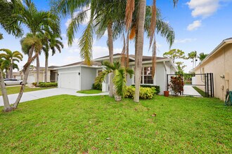 1209 Olympic Cir in Greenacres, FL - Building Photo - Building Photo