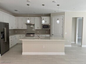 6856 Winding Cypress Dr in Naples, FL - Building Photo - Building Photo